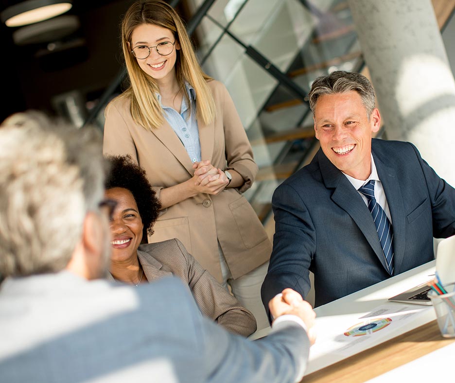 group of professionals in business meeting