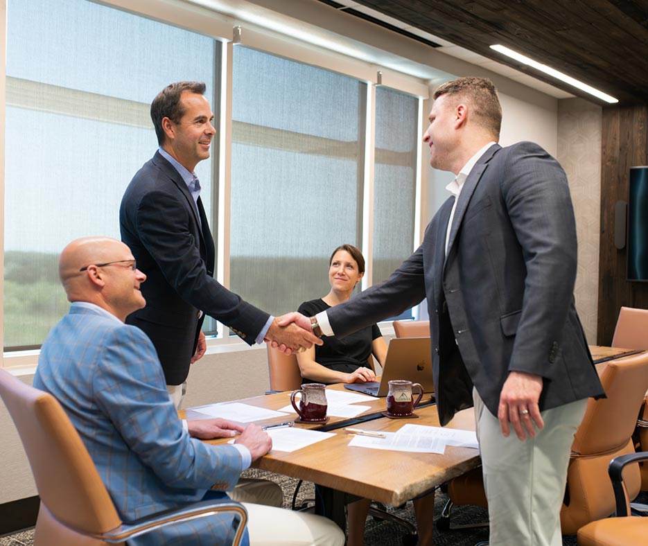 group of professionals in business meeting