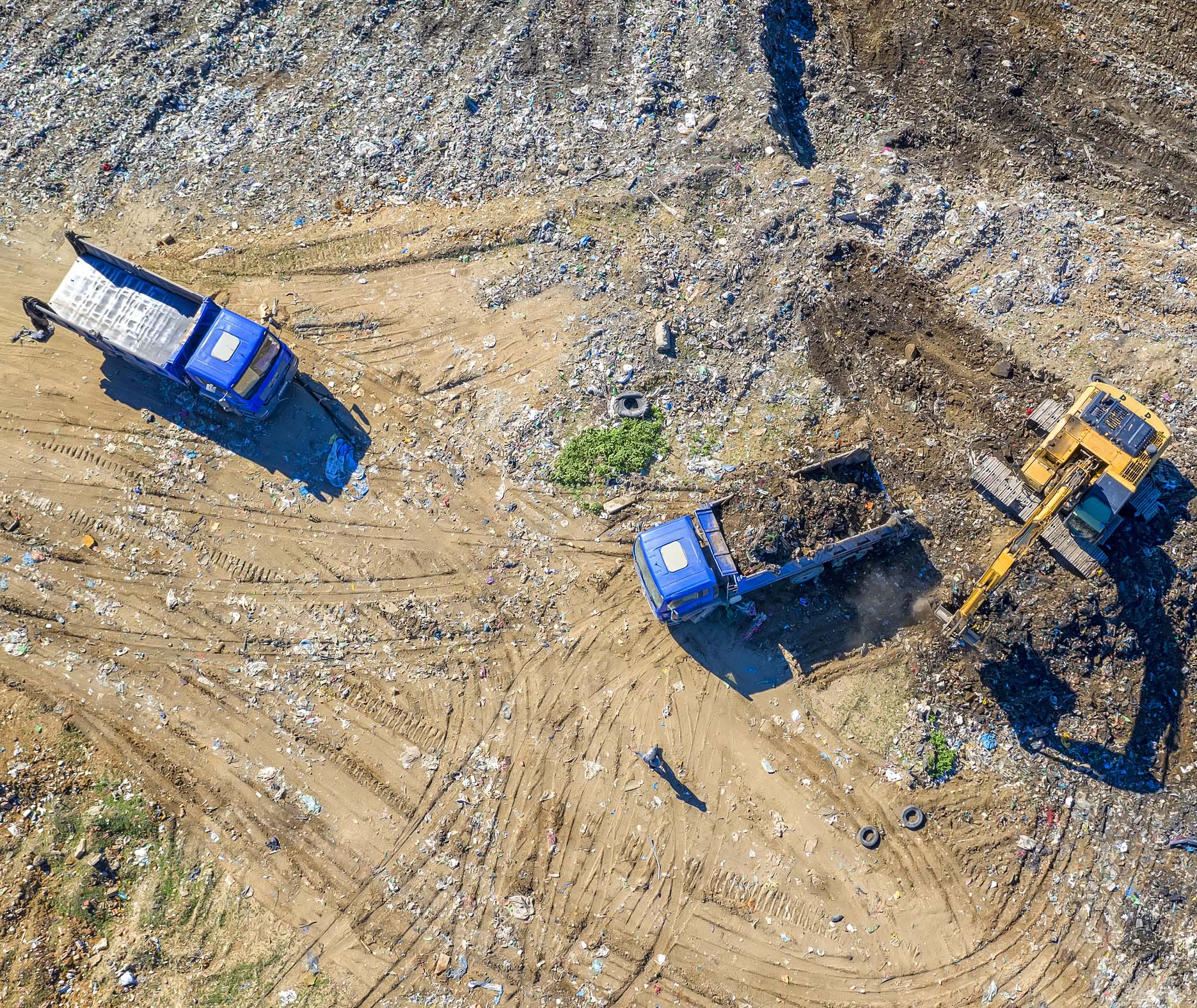 dump trucks picking up dirt